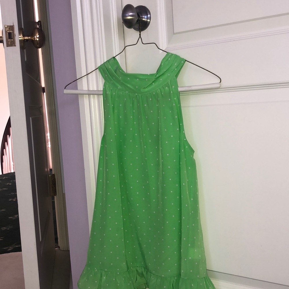 Green blouse tank top with ruffles.